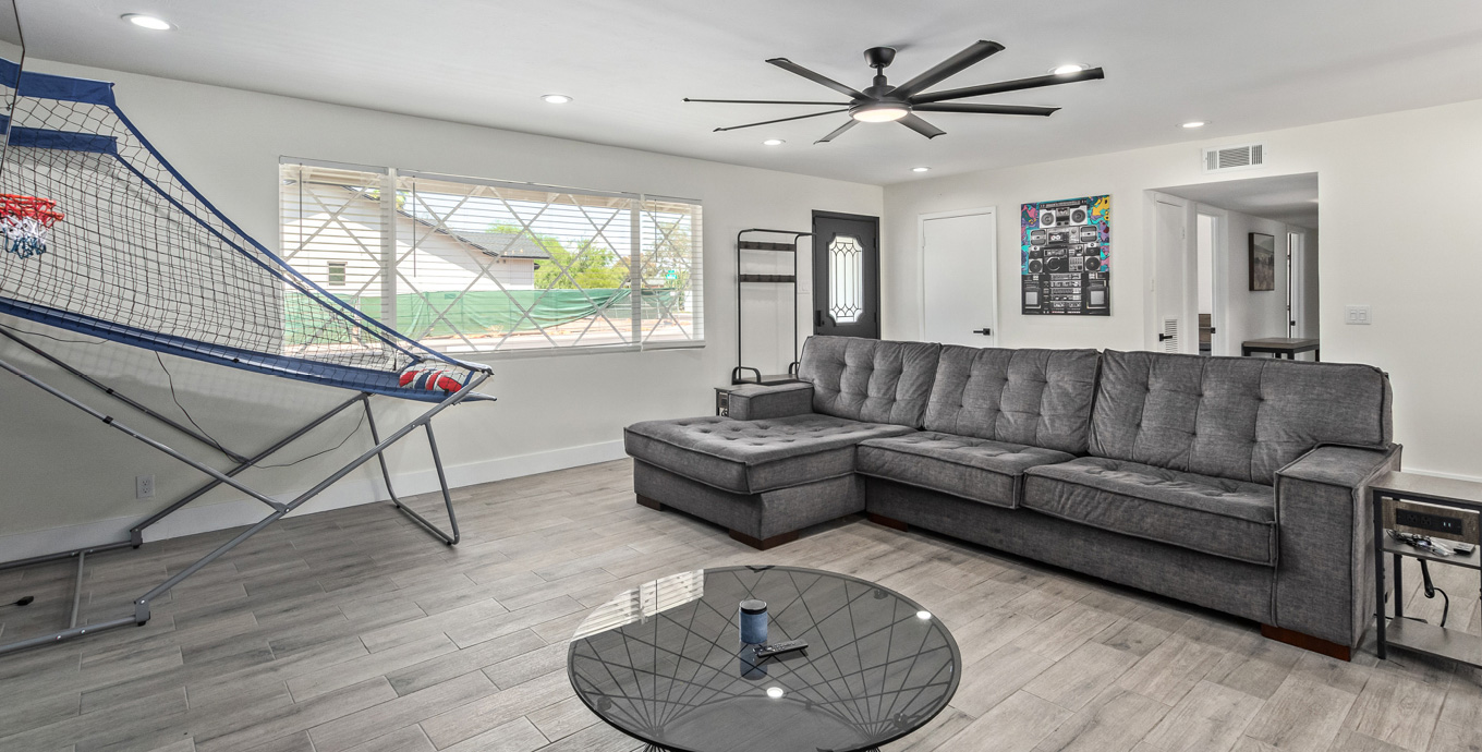 Living room area with basketball game